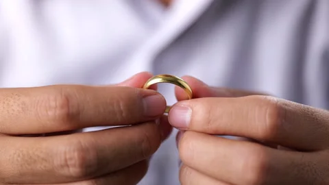 Close-up of man holding ring at home, Thinking about wedding Stock Footage 161614691
