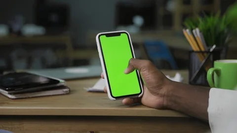 Close Up Man Holding Smartphone Touch Screen With Green Screen Chroma Key Video stock 121816087
