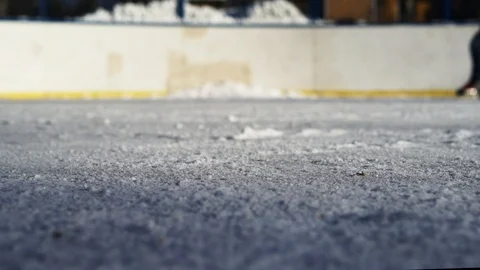 CLOSE- UP: Man ice skating and stopping Stock Footage 92761541