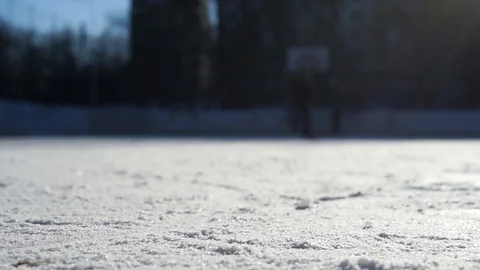 CLOSE- UP: Man ice skating and stopping Stock Footage 92761567