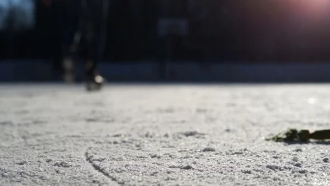CLOSE- UP: Man ice skating and stopping Stock Footage 92761575
