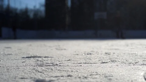 CLOSE- UP: Man ice skating and stopping Stock Footage 92761580