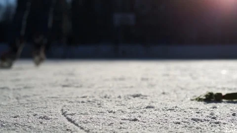 CLOSE- UP: Man ice skating and stopping Stock Footage 92761976
