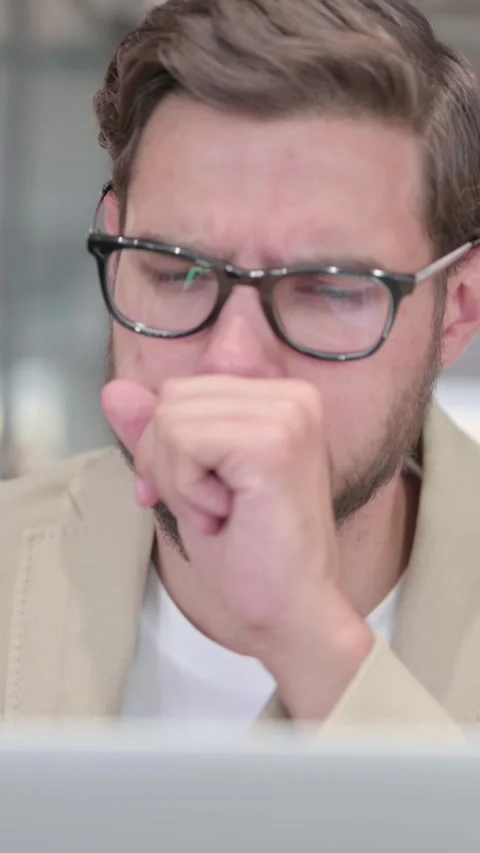 Close Up of Man with Laptop having Coughing, Vertical Video Stock Footage 342010461