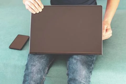 Close-up. man with laptop.Guy with computer Stock Photos