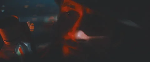 Close up of man looking into camera holding vintage camera Stock Footage 203568201