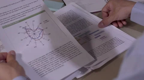 Close-up of man looking through some documents Stock-Footage 68713235