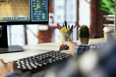 Close up of man making floor plan in CAD software 写真素材