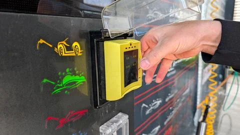 Close Up Of Man Making Payment At Self Service Car Wash 스톡 사진