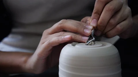 Close up of man making pottery on spinning table, Malaysia Stock Footage 146563860
