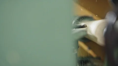 Close up of a man manually lathing a piece of wood Stock-Footage 100609807