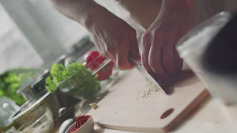 Close Up of Man Mincing Garlic Video stock 147312194