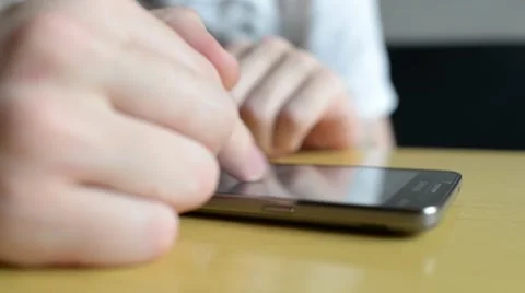 Close-up Man via Mobile Cell Phone browse Internet social networks like photo Stock Footage 64900298