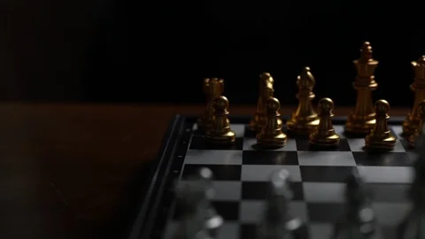 Close up Man moving chess pawn defeat enemy on chessboard Slow motion Stock Footage 106800704