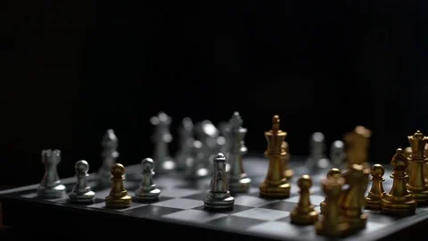 Close up man moving silver king chess defeat enemy on chessboard Slow motion Stock Footage 106800133
