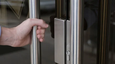 Close - up, the man opens the door to the clinic Stock Footage 104509300