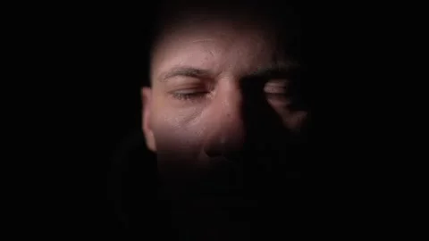 Close up man opens his eyes and looks at the camera Stock Footage 321125235