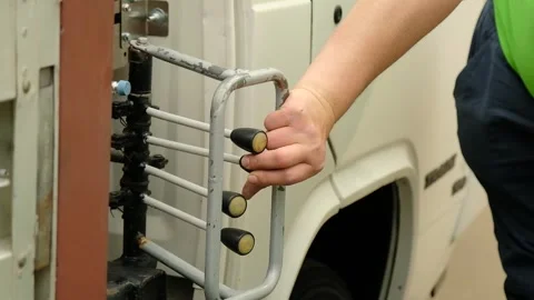 Close-Up of Man Operating Control Levers on Exterior Crane 스톡 동영상 254883415