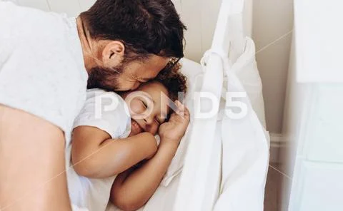 Close up of a man pampering his kid Stock Photos