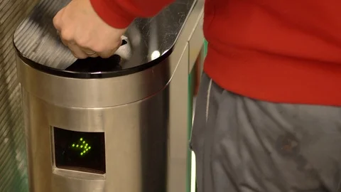 Close up man passing through a modern turnstile in automotive factory 動画素材 124606032