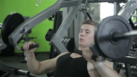 Close-up of a man performs gym exercises Stock Footage 66527921