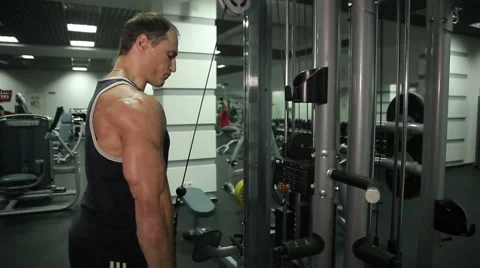 Close-up of a man performs gym exercises Stock Footage 67537416