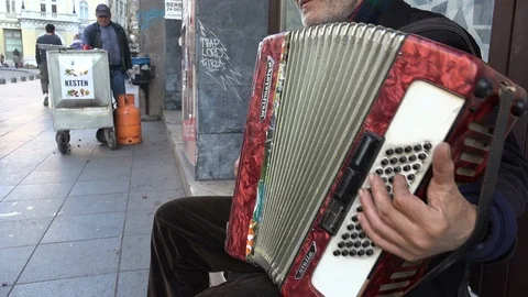 Close up of a man playing accordeon on streets of Sarajevo Stock Footage 85835772
