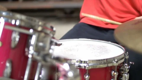 Close up of man playing the drumset in red outfit Video stock 104465591