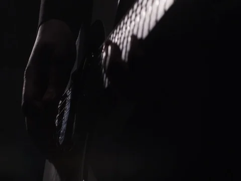 Close up of a man playing a guitar during a live performance. Stock Footage 70727588