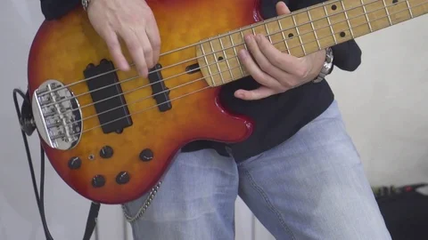 Close-up of a man playing the guitar Stock Footage 111729588