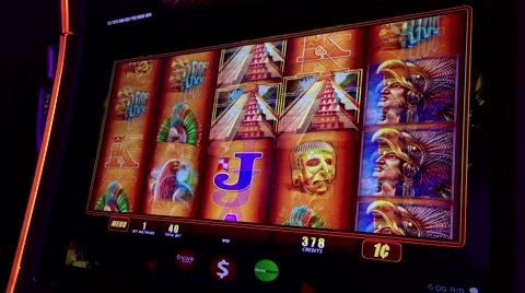 Close up man playing slot machine inside Hard Rock Casino Stock Footage 59788550