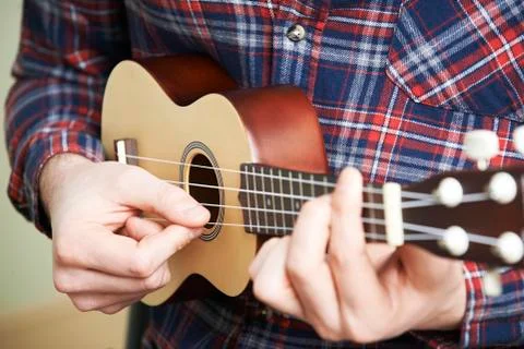 Close Up Of Man Playing Ukulele Stock Photos