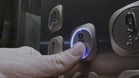 Close up of man pressing elevator button of the eight floor. Stock clip. Finger Stock Photos