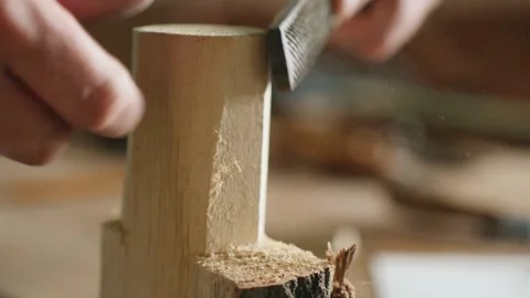 Close-up. a man processes a piece of wood with a file. the sound of tools Stock Footage 156683114