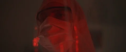 Close up of a man in protective suit with mask and glasses,looking around Stock Footage 126357549