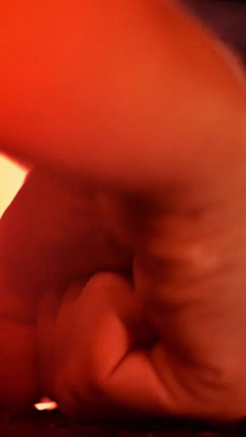 Close up of a man punching the keypad on a computer in a server room with Stock Footage 287379048