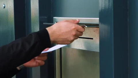 Close-up Of A Man Putting A Letting Inside A Payments Job Mailbox Stock Footage 127179872