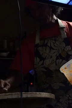 Close Up of Man Reaching for Plastic Container Photos