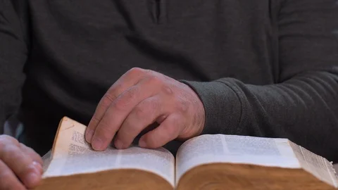 Close Up of Man Reading Bible. Video stock 129697168