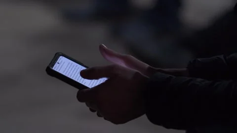 Close up of a man reading the Bible on his cell phone Stock Footage 266150910
