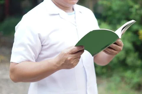 Close up man is reading book Foto stock