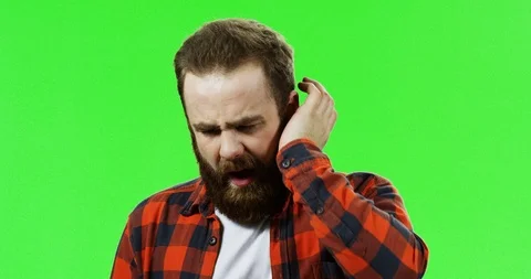 Close up of the man with a red beard having a strong pain in a tooth in front of Stock Footage 90364195