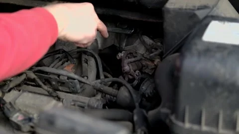 Close up of man repairing car engine Stock Footage 303071936