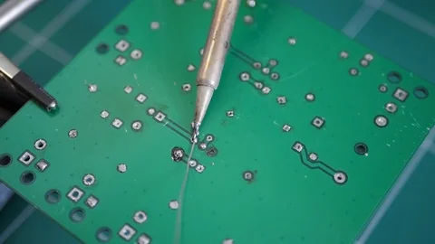 Close-up of man repairing electronic circuit board tin soldering Stock Footage