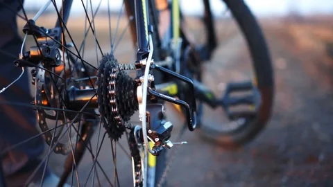 Close up. Man rides bicycle on starting for training working out. Sunset time. Stock Footage 88732155
