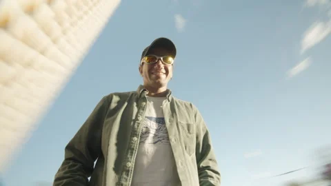 Close-up man riding on a carousel Stock Footage 261448614