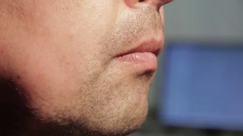 Close up man rubbing stubble on his face. Stock Footage 69254204
