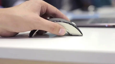 Close-up of man running with computer mouse and keyboard. Video stock 70935499
