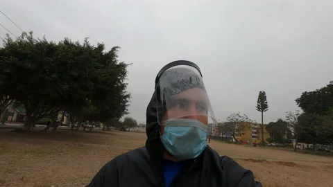 Close up of a man running with his face shield misted Stock Footage 141658874