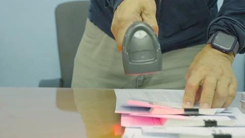 Close up Man scaning barcode for transfer data to computer. Stock Footage 172342282